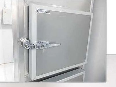 Mortuary Refrigerator — One Cell, close-up of closed door with stainless latch handle
